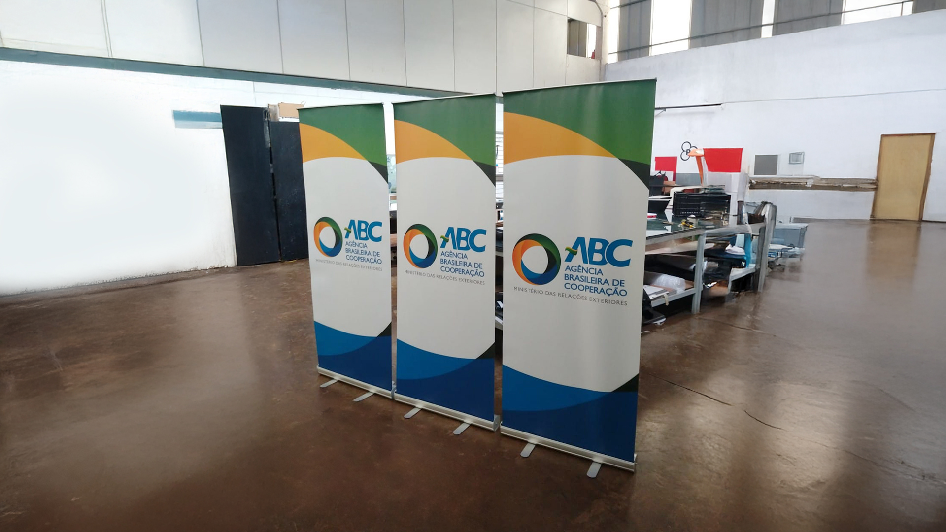 ngd banner roll up abc agencia brasileira cooperação lona vinil